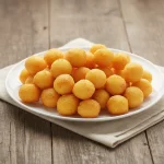 Porción de papas Noisette