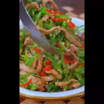 Cerdo con pimientos y ají chile
