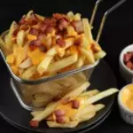 PORÇÃO DE FRITAS C/ CHEDDAR C/ BACON