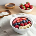 Açaí + 2 opção de creme + 6 toppings