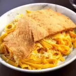 FETUCCINI HUANCAINA PESCADO APANADO