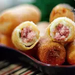 Enroladinho queijo e presunto - 25un