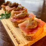 Brusqueta de Parma e figo