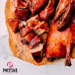 Pato asado entero