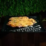 BISTEC DE CERDO GRATINADO CON QUESO