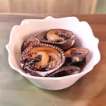 Porción de conchas