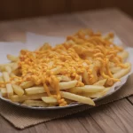 Porção com cheddar