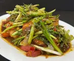 Cerdo con jengibre y cebollina
