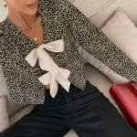 Blusa animal print con lazos