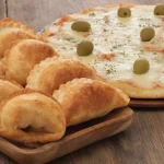 Una Muzza + 6 empanadas